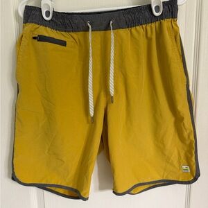 Vuori Men's Athletic Shorts in Mustard and Charcoal